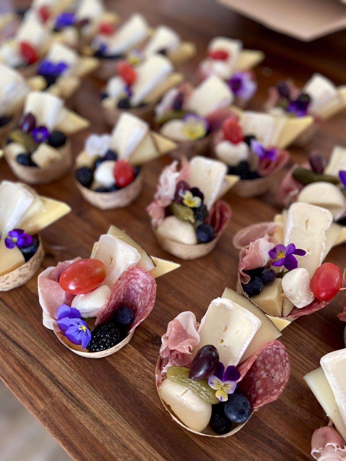 Board that holds and displays single serve charcuterie cones perfect for events
