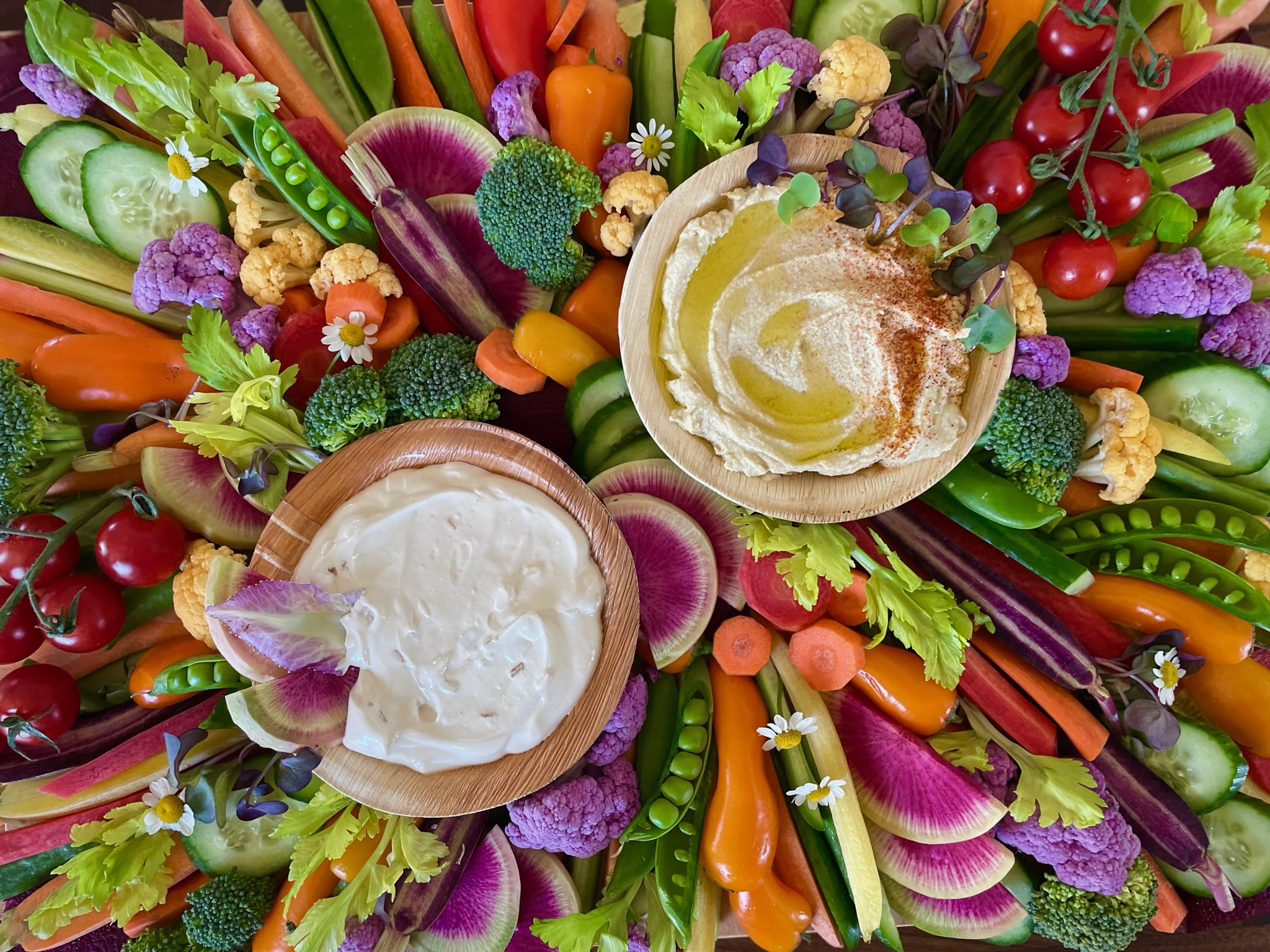 Bright crudite board made from farm fresh vegetables and available for pickup or delivery in Denver