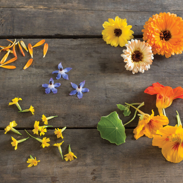 Edible flowers included in the charcuterie boards made by Wander + Graze in Denver. 